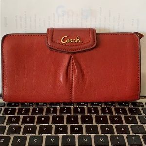 Nice red and gold coach wallet —
